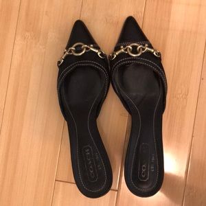 Authentic Coach mules with kitten heel.